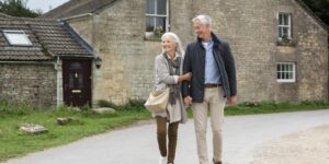 adorable-senior-couple-being-affectionate-while-taking-walk