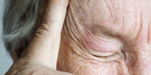 elderly-woman-suffering-from-migraine-headache